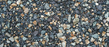 Granite rubble for the background. Building materials, crushed rock. Panoramic backgroundの写真素材