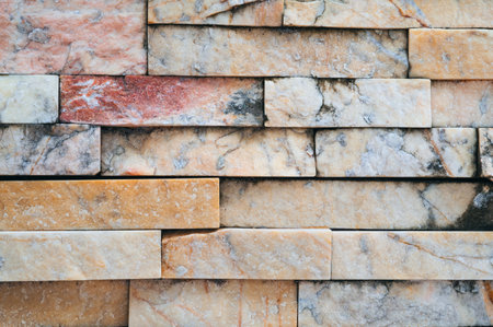 brick background, Abstract geometric pattern texture, Classic outdoor building granite blocks wall.の写真素材