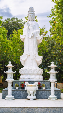 white statue of Lady Buddha in Vietnam in Asia in summer.の写真素材