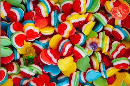 background of colorful jelly hearts. Top view of the candyの写真素材
