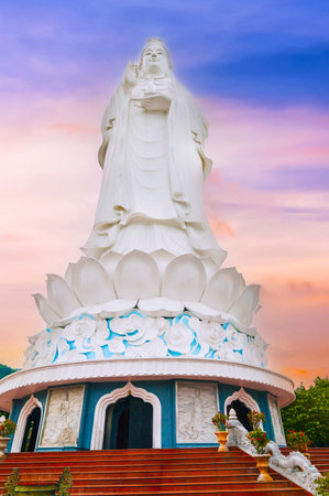 Large white statue of Lady Buddha in Da Nang Vietnam at Linh Ung Pagoda in summerの写真素材