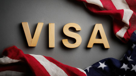 immigration and travel concept showing usa visa text with stars and stripes in the backgroundの素材