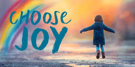 Child jumping with colorful background and positive quoteの素材