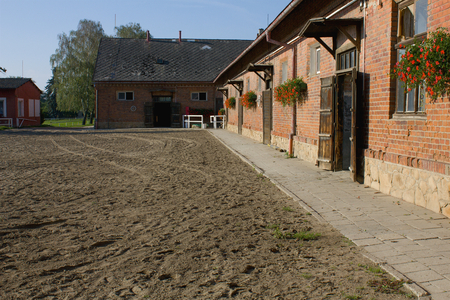 Old brick stables, exterior view, paddockの写真素材