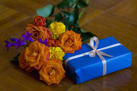 Wrapped gifts with flowersの写真素材