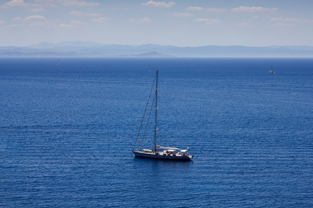 Sailing boats in the Mediterranean Sea. Yacht holidays at sea. Aerial view to sailboat.の写真素材