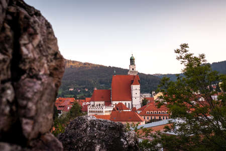 View to town Prachatice, South Bohemian Region, Czech Republic with Church of St. James the Greater from hill knows as "Zizkova skalka" after sunset. Cityscape of travel destination in Europeの写真素材