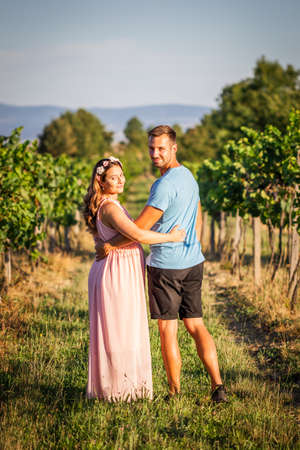 New life, new journey. Happy young married couple expecting baby. Pregnant woman with her husbandの写真素材