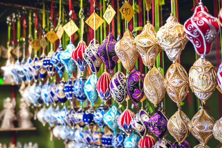 Christmas baubles and ornaments in kiosk at Christmas market in Vienna, Austria. Selling decoration during advent holidayの写真素材