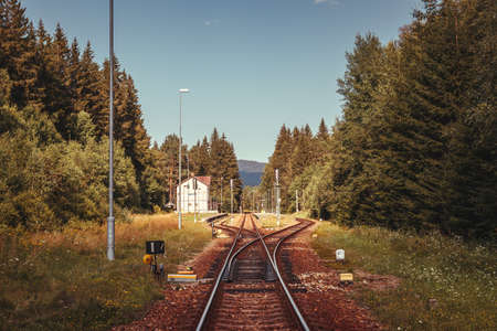 Train station know as Black Cross in natural park Sumava, Czech Republic. Railroad track in forest....