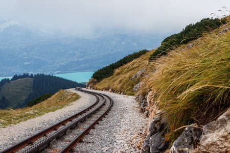Cog railroad track to Schafberg peak. Salzburger land Alps mountains. Tourist attraction in Upper Austria regionの写真素材