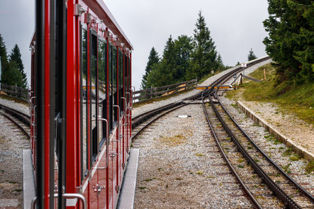 Cog railway train going to Schafberg. Alps mountain in Salzburger land. Tourist attraction in Upper Austriaの写真素材