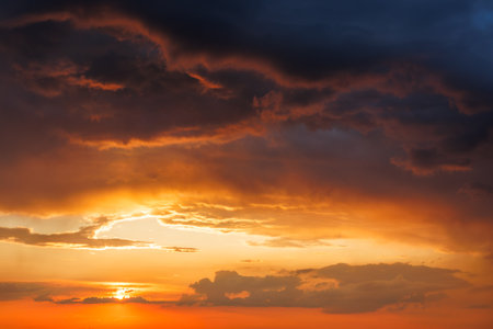 Dramatic sky with storm clouds during sunset. Summer stormy weatherの写真素材