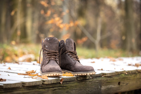 Leather hiking boot. Waterproof ankle shoes for outdoor activities. Autumn and winter fashion footwearの写真素材