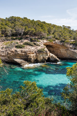 Turquoise sea and cliffs near Cala Cap Falco beach in Mallorca. Beautiful natural scenery on the Balearic Islandsの写真素材