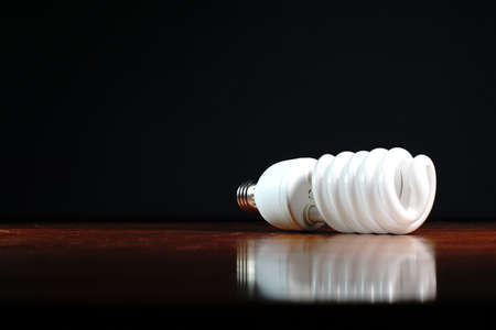 Light bulb on black backgroundの写真素材