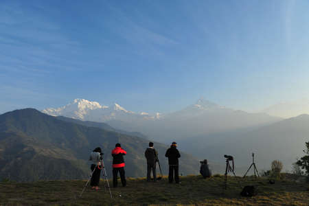 A group of photographer taking photo of Annapurna in Dhampus, Nepalのeditorial素材