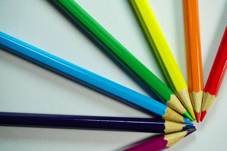 Colour pencils isolated on white background close up