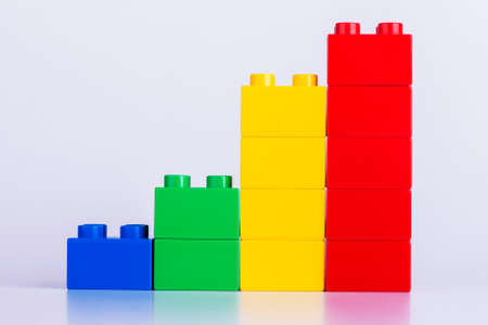 stack of colourful block over white backgroundの写真素材