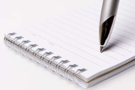 Lined notebook and penの写真素材
