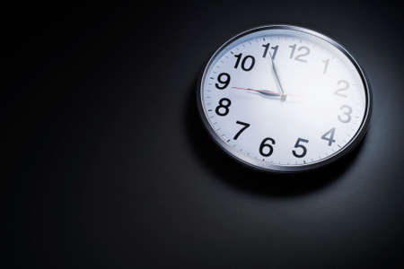 Image of clock on with left space room for textの写真素材