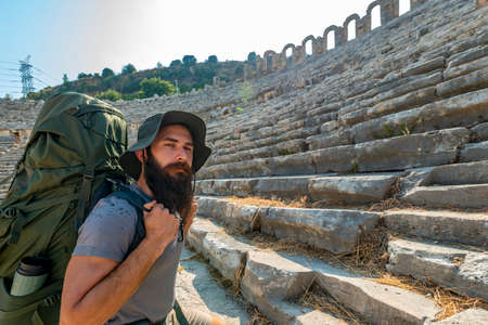 A hiker in Perge (Perga Ancient City) Ancient City and Ruins.の写真素材