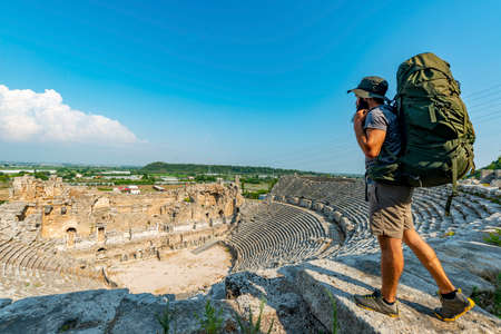 Aksu, Antalya / Turkey. A hiker in Perge (Perga Ancient City) Ancient City and Ruins.の写真素材