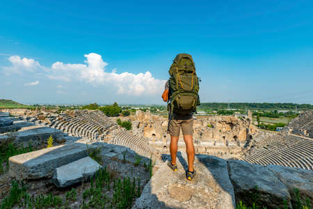 Aksu, Antalya / Turkey. A hiker in Perge (Perga Ancient City) Ancient City and Ruins.の写真素材
