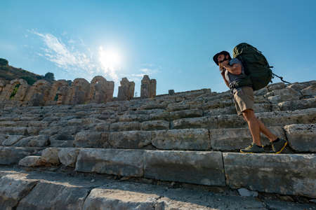 A hiker in Perge (Perga Ancient City) Ancient City and Ruins.の写真素材