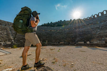 Aksu, Antalya / Turkey. A hiker in Perge (Perga Ancient City) Ancient City and Ruins.の写真素材