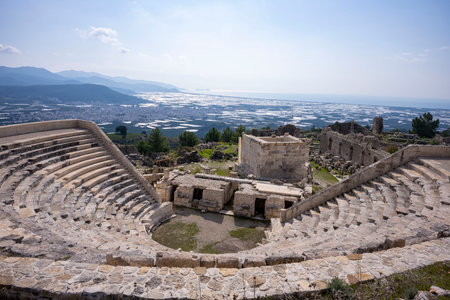The remains of an Opramoas monument, aqueduct, a small theater, a temple of Asclepius, sarcophagi, and churches from Rhodiapolis, which was a city in ancient Lycia. Today it is locの写真素材