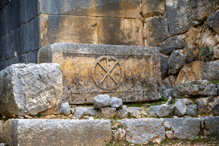 Remains of gymnasium in acnient Lycian city Arycanda. Ancient city on mountain near Aykiricay village.Well preserved semi-circular theater of Arycanda, ancient Lycian city in Antalの写真素材