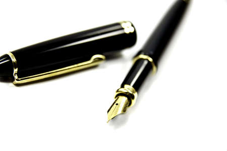 golden fountain pen isolated on white