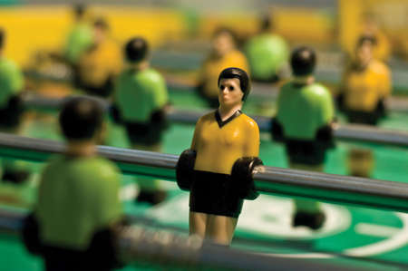 Closeup of little tabletop soccer player