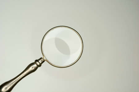 magnifying glass isolated on white background, equipment lens or magnifier loupeの写真素材