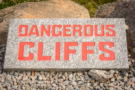 sign dangerous cliffs cornwall Lands End, Englandの写真素材