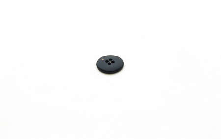 one button of T-Shirt on white background