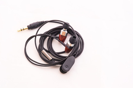 Earphones with black line on a white background