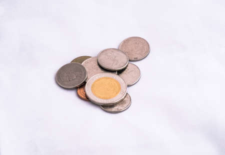 Thai Baht Coins on white backgroundの写真素材