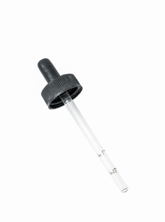 Macro closeup of glass dropper with scale and black rubber top isolated on white backgroundの写真素材