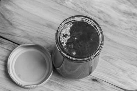 top view strawberry jam in bottle with a cap; fruit jamの写真素材
