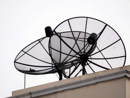 Satellite dishes communication technology network in daily lifeの写真素材