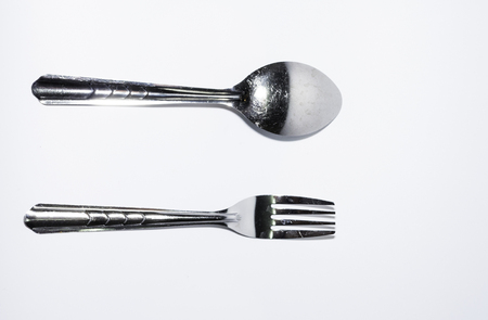 fork and spoon on white backgroundの写真素材