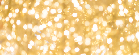 Christmas abstract gold background with bokeh light, Slightly abstract bokehの写真素材