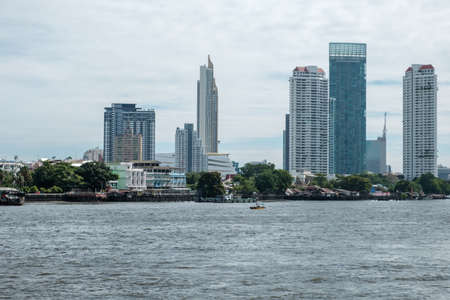 Modern large building located on the bank of the riverの写真素材