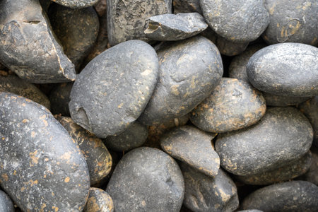 Pebble stone texture background. Close-up of pebbles.の写真素材