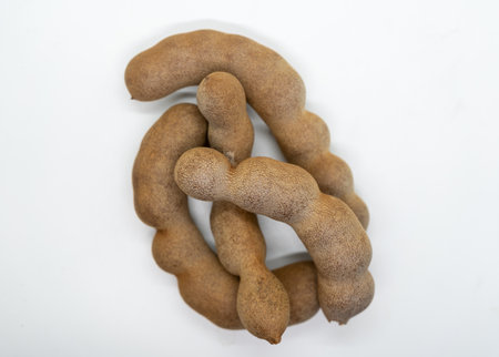 Sweet tamarind on white background,Tamarindus indicaの写真素材