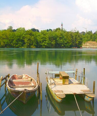 Rowing boats on the shore of the river Adda - Italyの写真素材