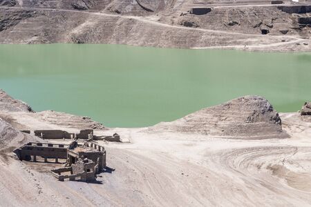 hydroelectric site on Alps with dam and artificial lakeの写真素材
