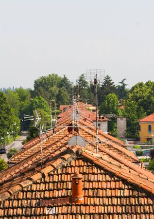 roofs of houses lined up one behind the otherの写真素材